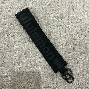 Black lululemon keychain